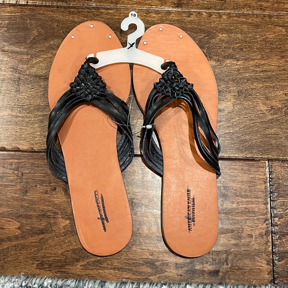 BRAND NEW! Black AE flip flops